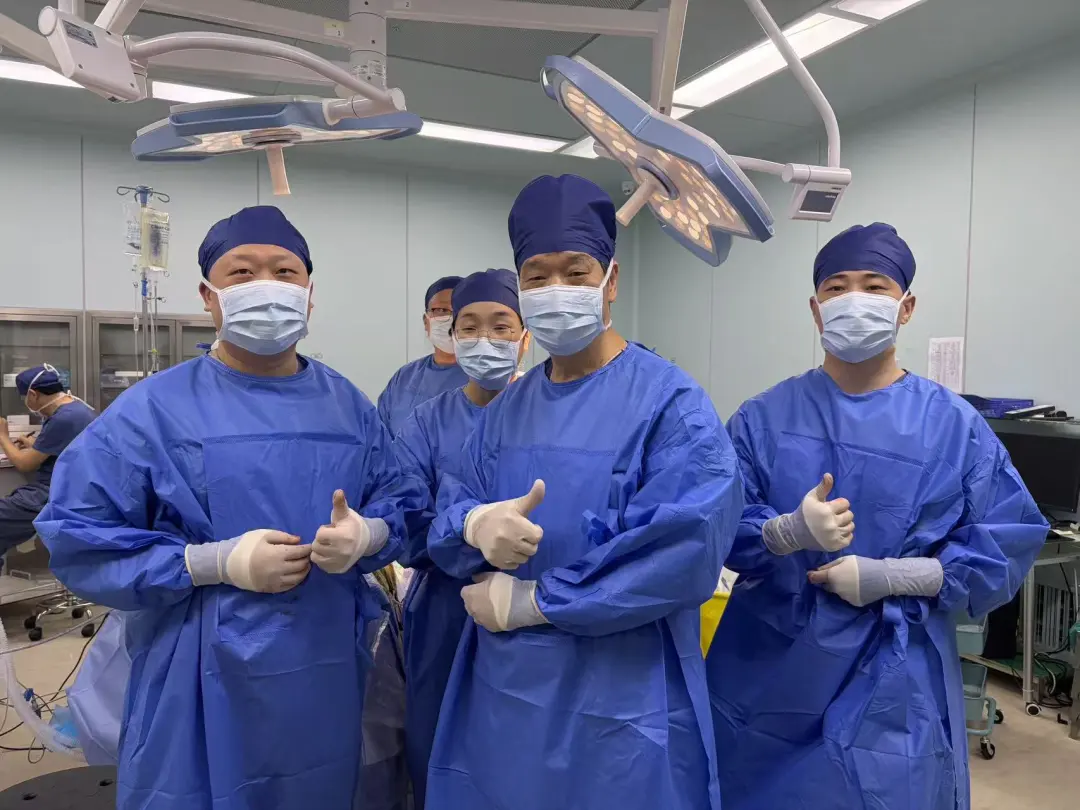 The surgical team at Shanghai Donglei Brain Hospital celebrating after the successful DBS surgery